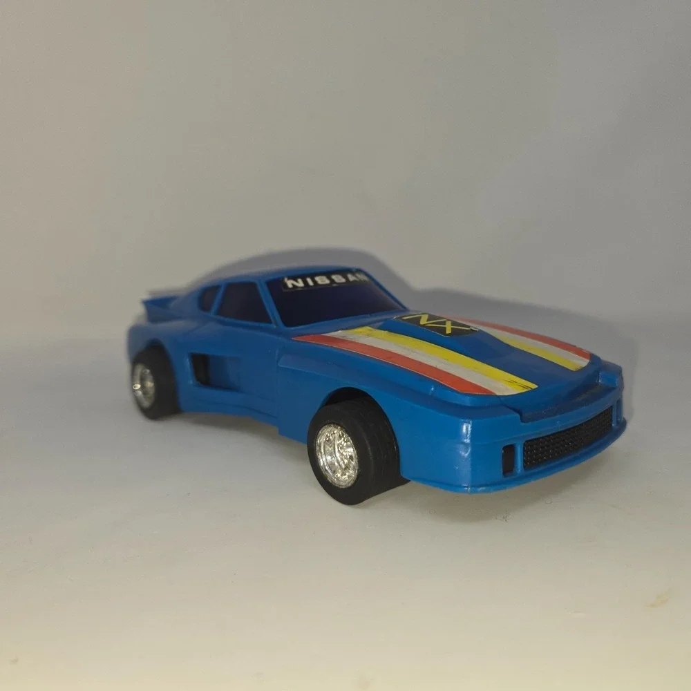 Lanard Toys Pull String Nissan ZX Blue Race Car Pull Cord 1982 Works Vintage